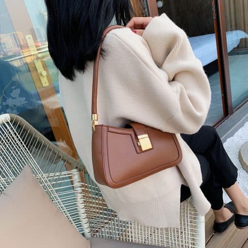 Solid Color PU Leather Shoulder BagsHandbagsmainimage1LEFTSIDE-Solid-Color-PU-Leather-Shoulder-Bags-For-Women-2022-hit-Lock-Handbags-Small-Travel-Hand